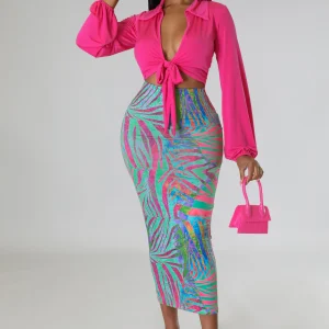 Ensemble jupe longue rose imprimée avec  top à manche longue