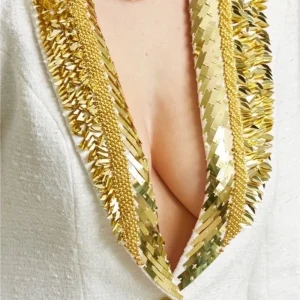 Blazer col pailleté doré