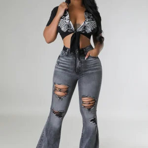 Jean déchiré taille haute bas large extensible